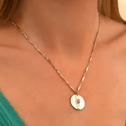Sun pendant necklace in hammered metal with crystal - pink